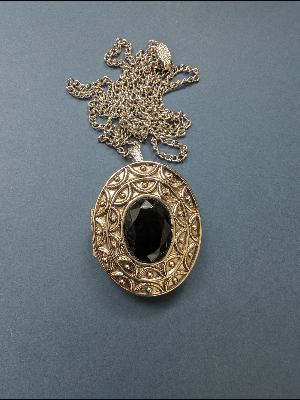 Vintage Avon Silver-Tone Oval Locket Perfume Necklace with Black Faceted Stone